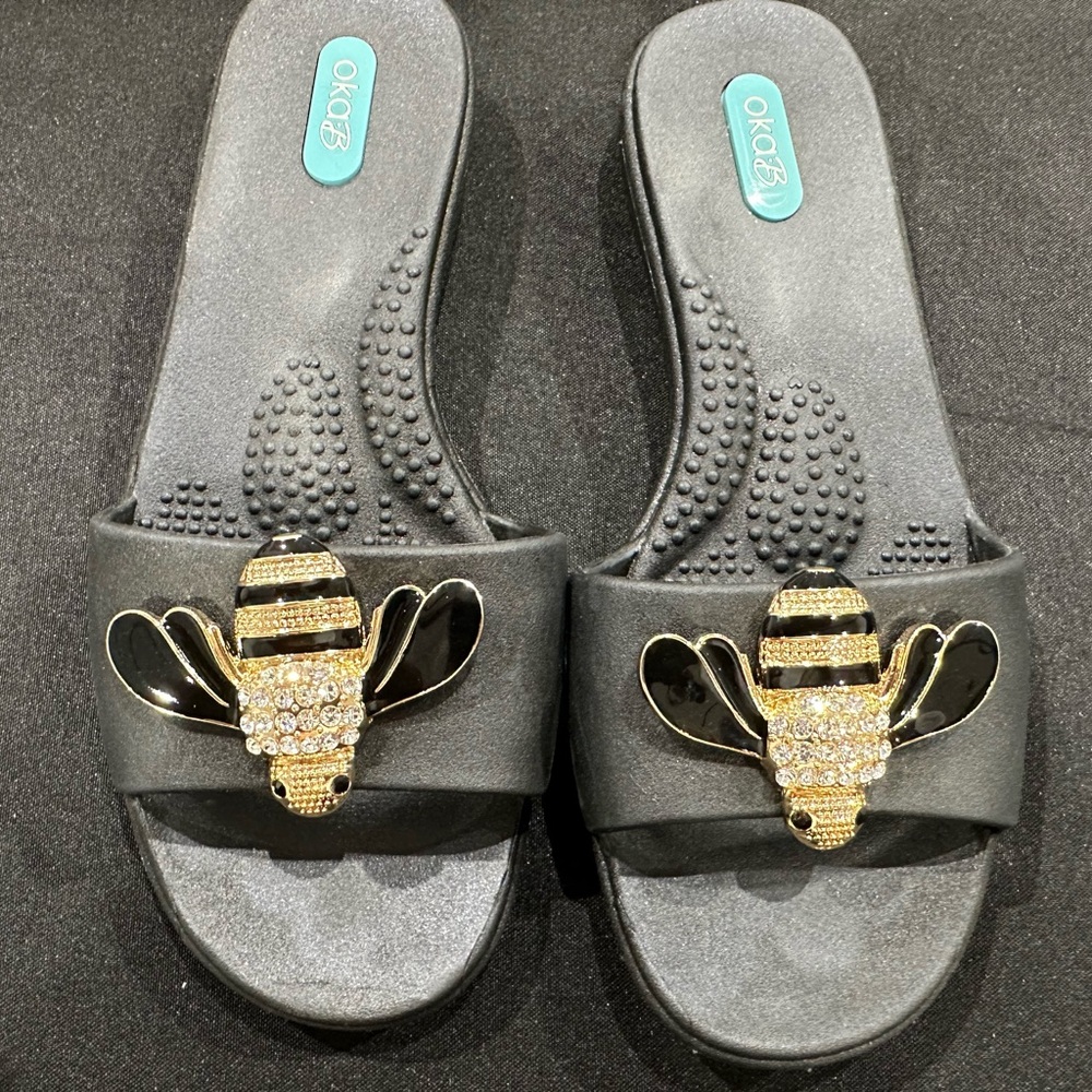OKA b. Black Slide Sandals with Gold Bee Accent